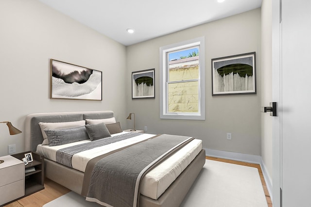 bedroom featuring light hardwood / wood-style flooring