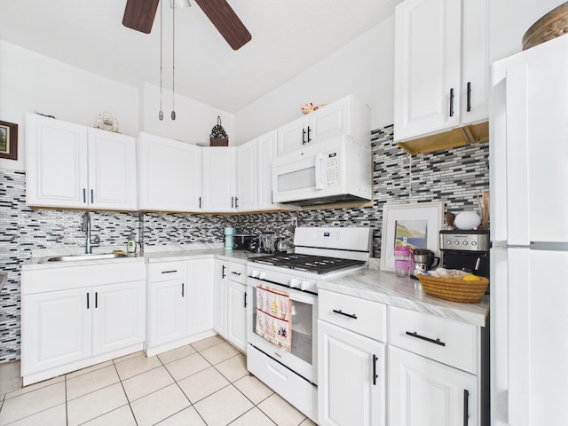 61 65th St Unit 10, West New York, NJ 07093 - kitchen with white appliances, light tile patterned flooring, backsplash, and a ceiling fan