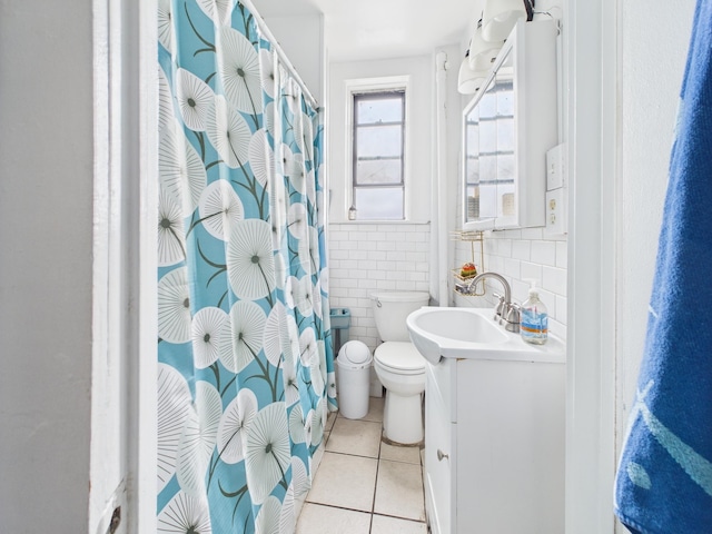 61 65th St Unit 10, West New York, NJ 07093 - full bath featuring tile patterned floors, vanity, tile walls, and a shower with curtain