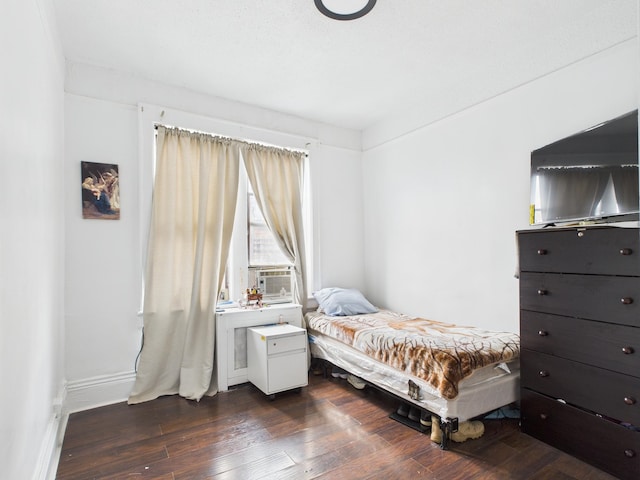 61 65th St Unit 10, West New York, NJ 07093 - bedroom with dark wood-style flooring and baseboards