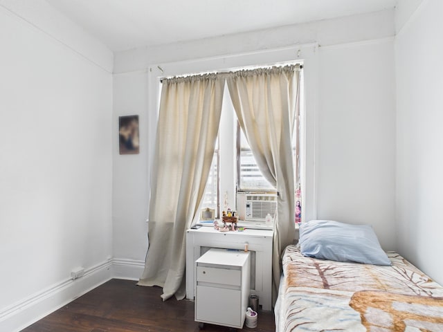 61 65th St Unit 10, West New York, NJ 07093 - bedroom with dark wood-style flooring and baseboards