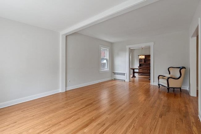577 New Jersey Ave, Lyndhurst, NJ 07071 - spare room with radiator, light wood finished floors, and baseboards