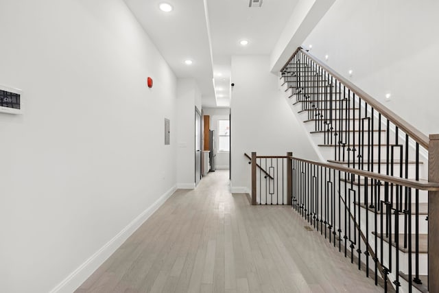 133 Clifton Pl Unit 3, Jersey City, NJ 07304 - corridor featuring light wood-style floors, recessed lighting, baseboards, and an upstairs landing