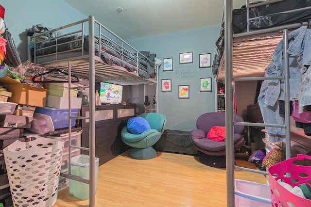 bedroom featuring wood-type flooring