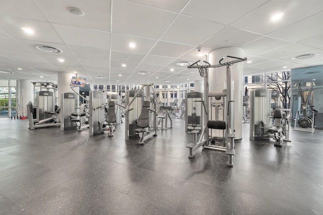 gym featuring a drop ceiling