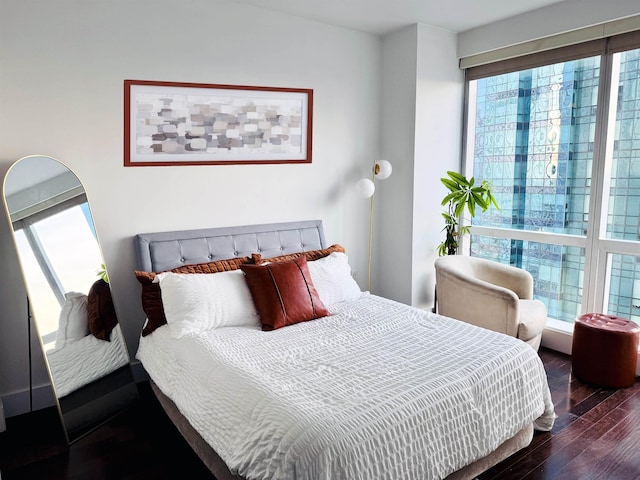 bedroom featuring wood finished floors