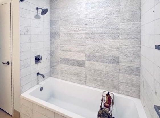 full bath featuring tiled shower / bath combo