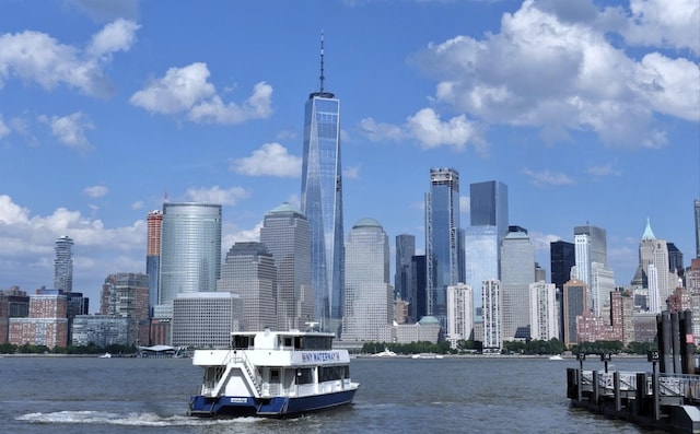 property's view of city featuring a water view