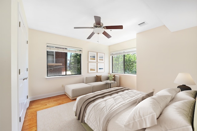 136 41st St Unit 103, Union City, NJ 07087 - bedroom with light wood-style floors, baseboards, and a ceiling fan