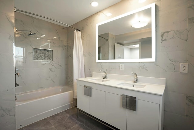 1 Columbus Pl Unit 1, Cliffside Park, NJ 07010 - full bathroom featuring shower / tub combo with curtain, double vanity, marble finish floors, and tile walls