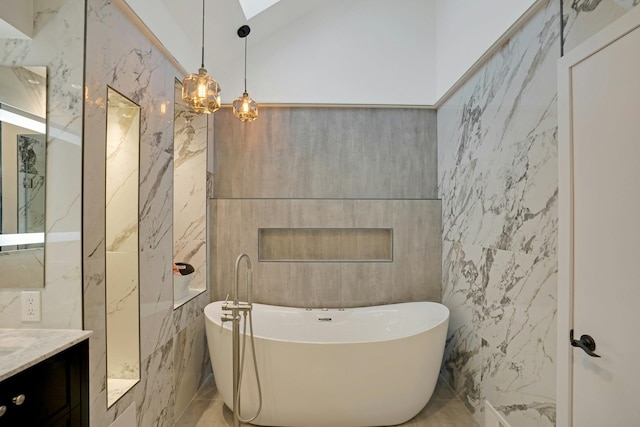 1 Columbus Pl Unit 1, Cliffside Park, NJ 07010 - full bath featuring tile walls, a skylight, vanity, a soaking tub, and a shower