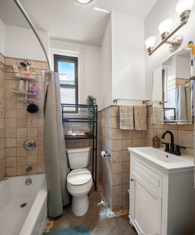 1114 Hudson St Unit 9, Hoboken, NJ 07030 - full bath featuring tile walls, toilet, vanity, shower / tub combo, and tile patterned flooring