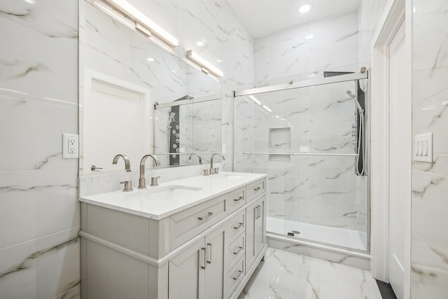 98 Van Horne St Unit A, Jersey City, NJ 07304 - bathroom featuring marble finish floor, a sink, and a marble finish shower
