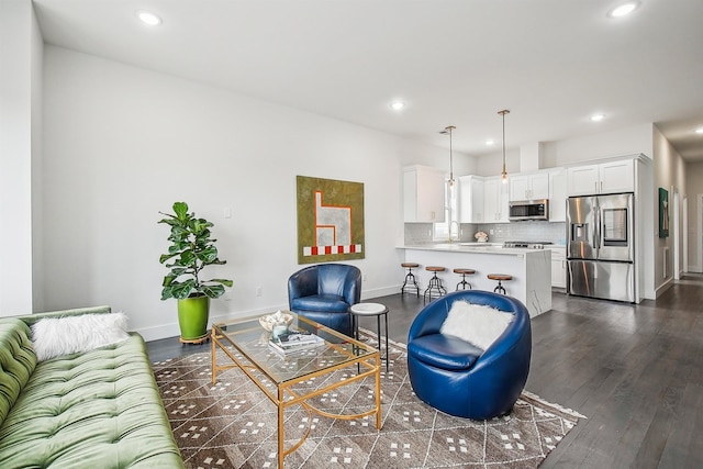 98 Van Horne St Unit A, Jersey City, NJ 07304 - living area featuring baseboards, dark wood-style flooring, and recessed lighting