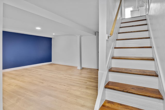 179 W 8th St, Bayonne, NJ 07002 - stairway featuring wood finished floors, recessed lighting, and baseboards