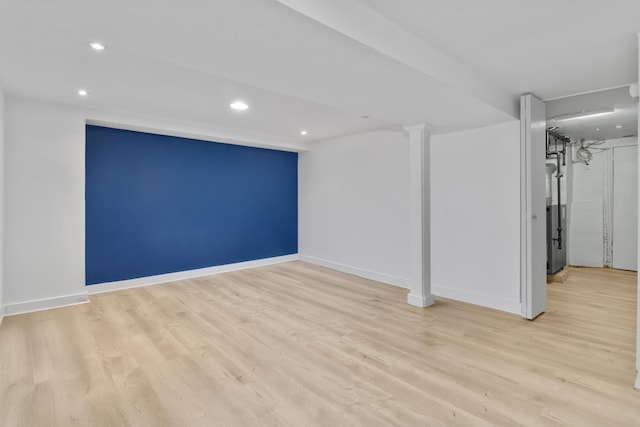 179 W 8th St, Bayonne, NJ 07002 - finished basement with recessed lighting, light wood finished floors, and baseboards