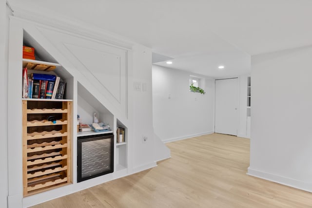 179 W 8th St, Bayonne, NJ 07002 - indoor dry bar featuring wood finished floors, baseboards, recessed lighting, and built in shelves