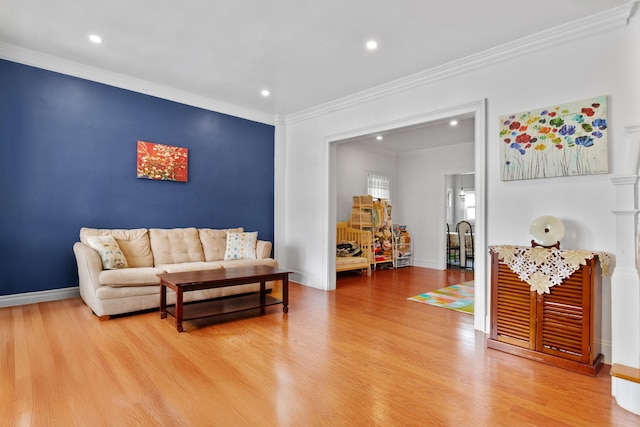 179 W 8th St, Bayonne, NJ 07002 - living area with wood finished floors, recessed lighting, ornamental molding, and baseboards