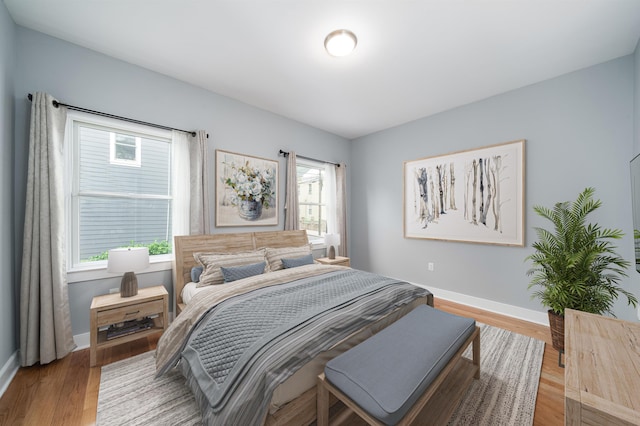 31 Ravine Ave Unit 1, Jersey City, NJ 07307 - bedroom with baseboards and wood finished floors