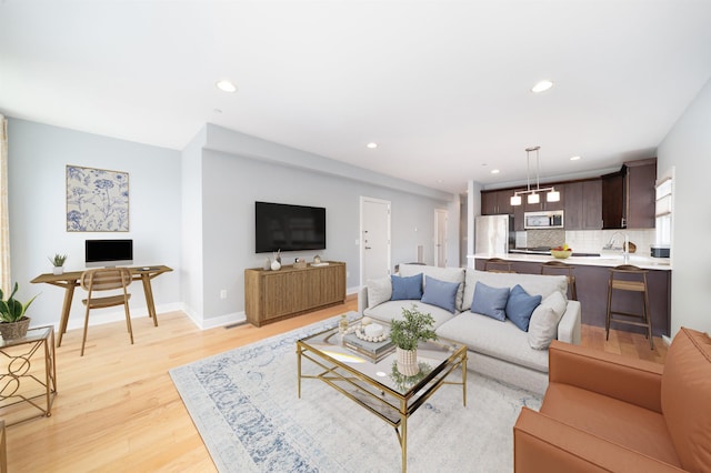 31 Ravine Ave Unit 1, Jersey City, NJ 07307 - living area featuring light wood finished floors, recessed lighting, and baseboards