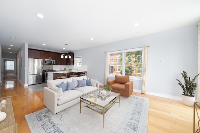 31 Ravine Ave Unit 1, Jersey City, NJ 07307 - living area featuring light wood-style flooring, recessed lighting, and baseboards