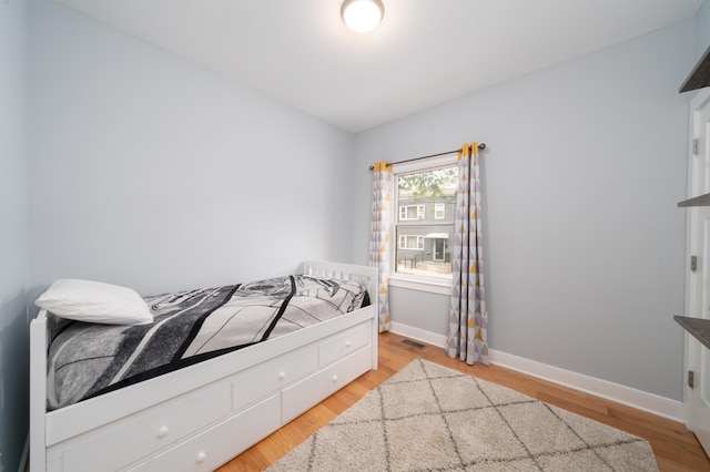 31 Ravine Ave Unit 1, Jersey City, NJ 07307 - bedroom with baseboards and wood finished floors