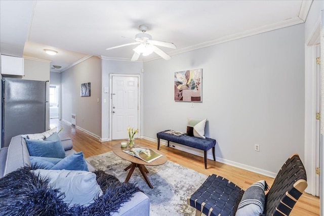 519 Willow Ave Unit 3, Hoboken, NJ 07030 - living room featuring light wood-style flooring, ornamental molding, ceiling fan, and baseboards
