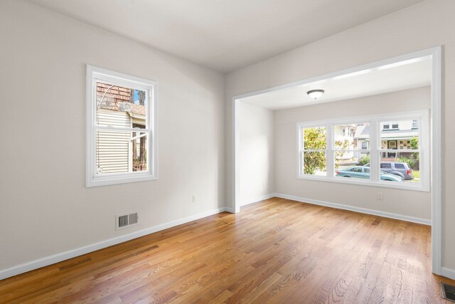 195 Stanley Pl, Hackensack, NJ 07601 - unfurnished room with baseboards and light wood-type flooring