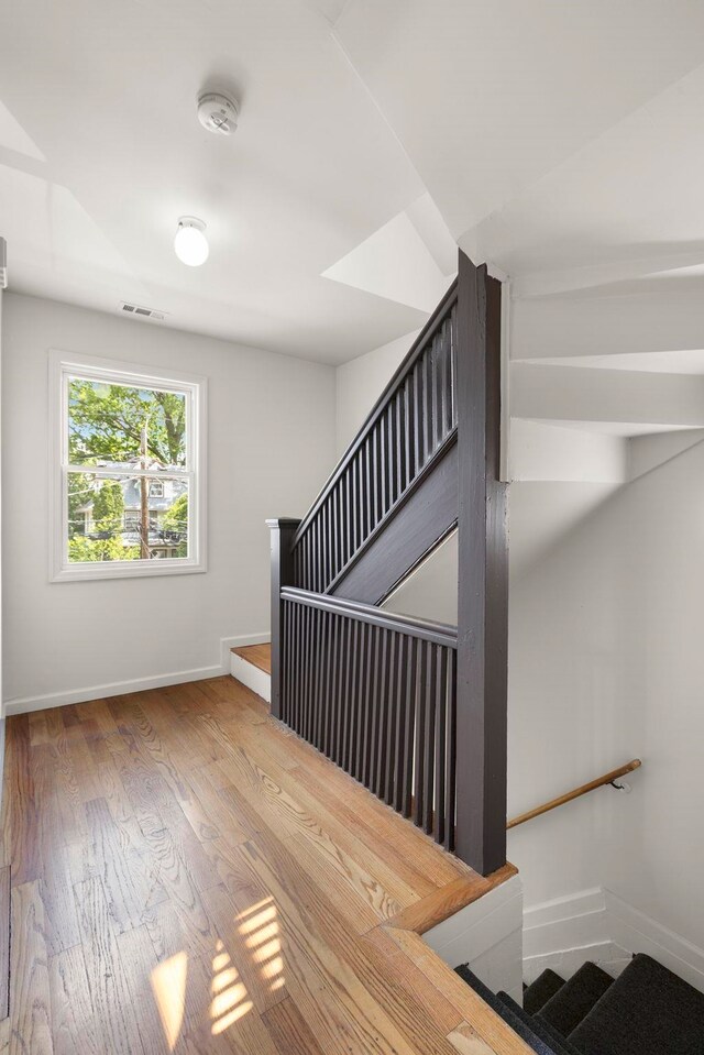 195 Stanley Pl, Hackensack, NJ 07601 - stairs with baseboards and wood finished floors