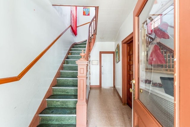 914 19th St, Union City, NJ 07087 - staircase featuring tile patterned floors and baseboards