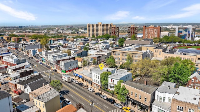 birds eye view of property featuring a view of city