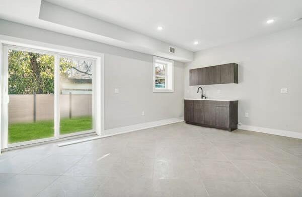 interior space featuring light tile patterned flooring