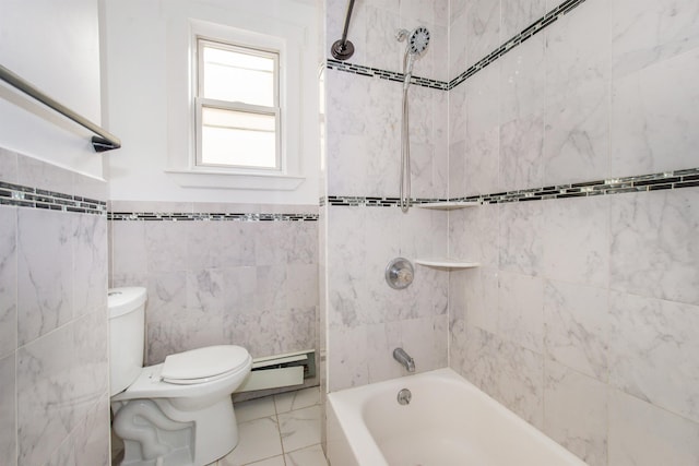 bathroom featuring tile walls, a baseboard heating unit, toilet, and tiled shower / bath