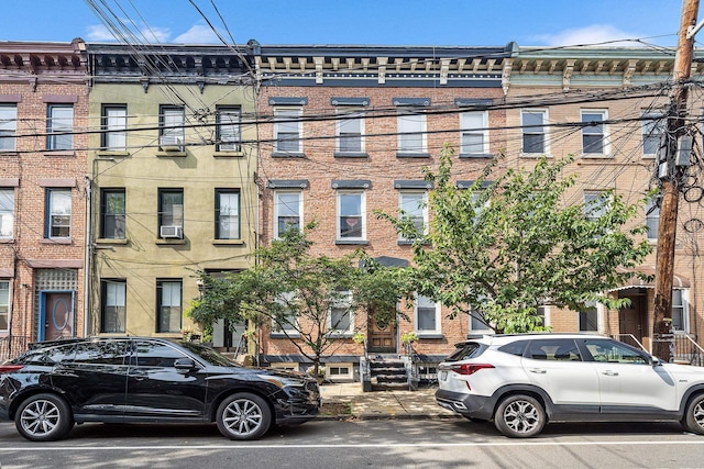352 7th St Unit 3, Jersey City, NJ 07302 - view of front facade featuring brick siding and cooling unit