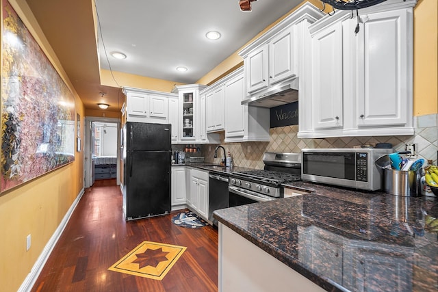 352 7th St Unit 3, Jersey City, NJ 07302 - kitchen featuring stainless steel appliances, dark wood finished floors, white cabinetry, under cabinet range hood, and recessed lighting