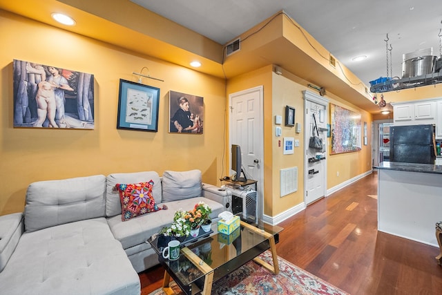 352 7th St Unit 3, Jersey City, NJ 07302 - living area with dark wood finished floors and recessed lighting