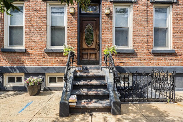 352 7th St Unit 3, Jersey City, NJ 07302 - property entrance featuring brick siding and a gate