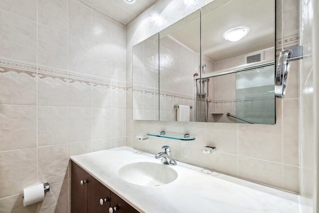 300 Winston Dr # 1822, Cliffside Park, NJ 07010 - bathroom featuring tile walls, vanity, and a tile shower