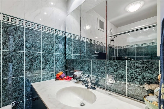 300 Winston Dr # 1822, Cliffside Park, NJ 07010 - bathroom with tile walls, vanity, and tiled shower