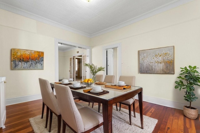 572 Gregory Ave, Weehawken, NJ 07086 - dining area featuring hardwood / wood-style floors and ornamental molding