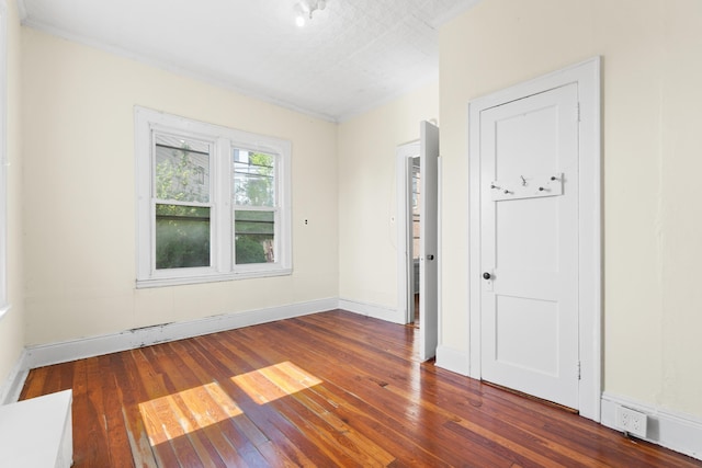 572 Gregory Ave, Weehawken, NJ 07086 - empty room featuring wood-type flooring and baseboards