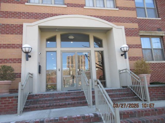 26 Ave At Port Imperial Unit 212, West New York, NJ 07093 - doorway to property with brick siding