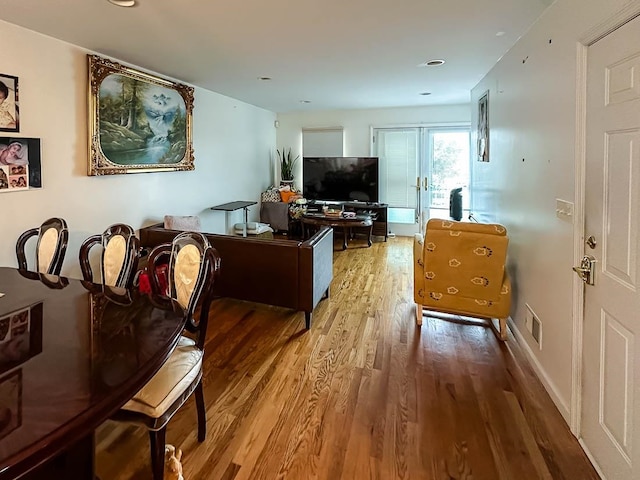 living room with wood-type flooring