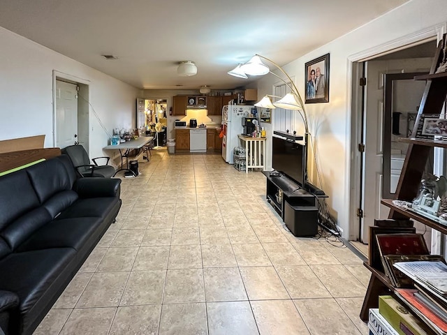 living room with light tile patterned floors