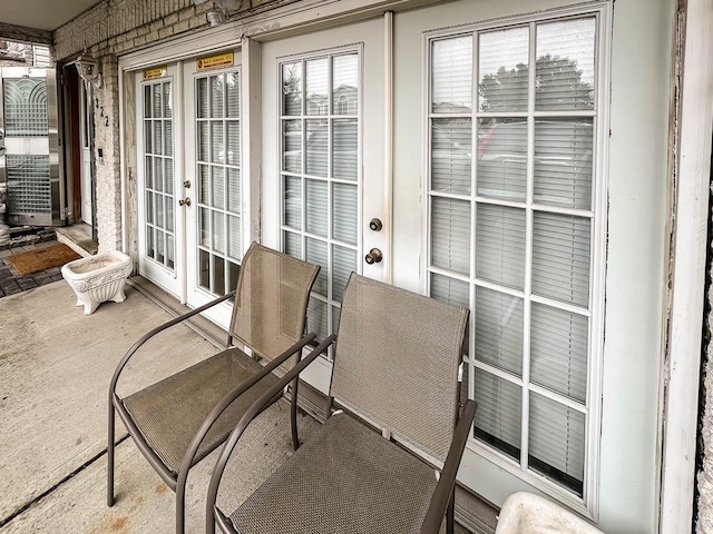 sunroom featuring french doors