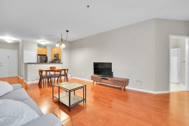 26 Ave At Port Imperial Unit 133, West New York, NJ 07093 - living room featuring light wood finished floors and baseboards