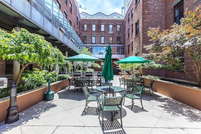 view of patio with outdoor dining area