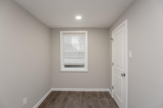 23 Westervelt Pl, Jersey City, NJ 07304 - empty room with dark wood-style flooring and baseboards