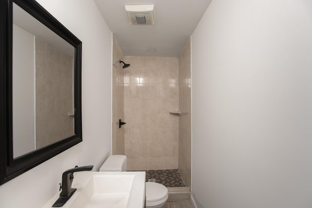 23 Westervelt Pl, Jersey City, NJ 07304 - full bath featuring toilet, tiled shower, and a sink