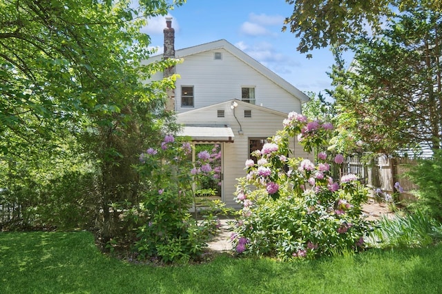 16 Hazel Ave, Livingston, NJ 07039 - view of side of home featuring a chimney